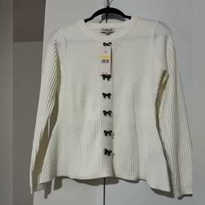 Elegant Cream Sweater with Black Accents
